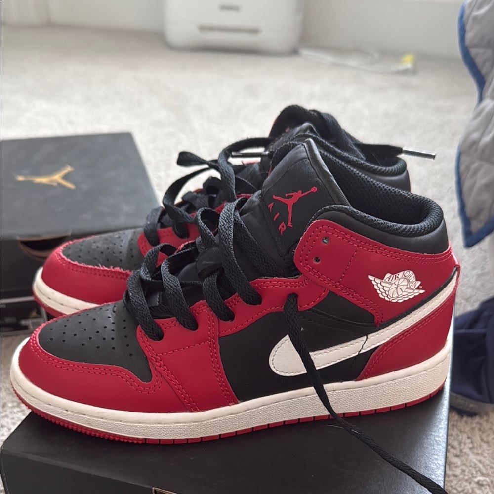 Air Jordan 1 Mid Black Red Sneakers